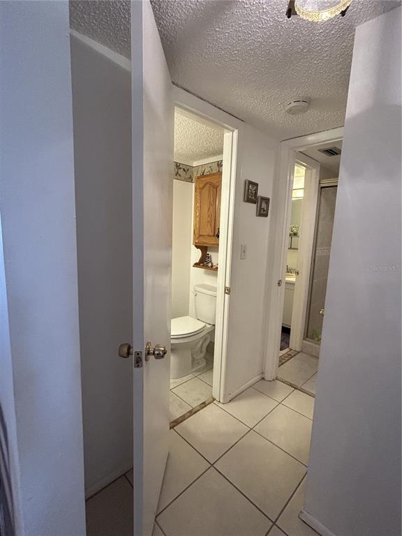 11485 Oakhurst Road, Unit 200318 Largo, FL 33774 - Photo 28 of 48 a bathroom with a sink and toilet