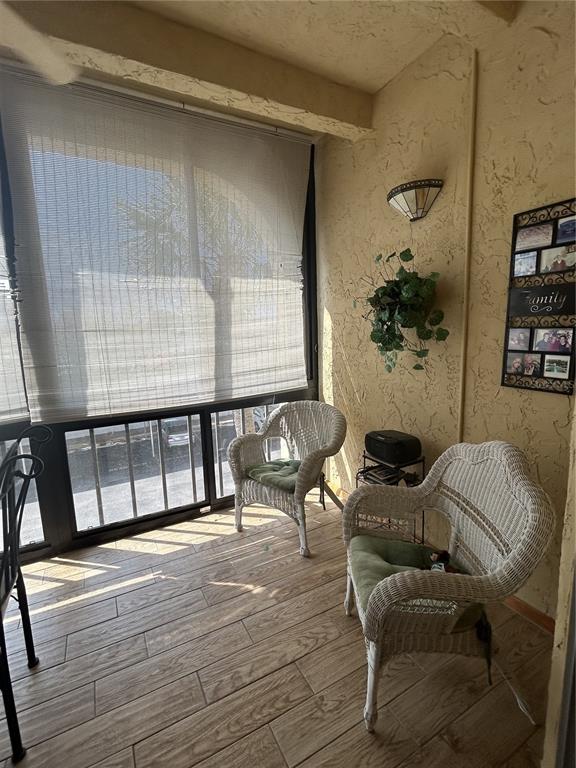 11485 Oakhurst Road, Unit 200318 Largo, FL 33774 - Photo 30 of 48 a living room with furniture and a window