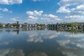 11485 Oakhurst Road, Unit 200318 Largo, FL 33774 - Photo 46 of 48 a view of a lake view