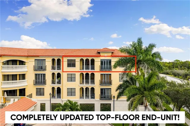 a black and white building with a view of building