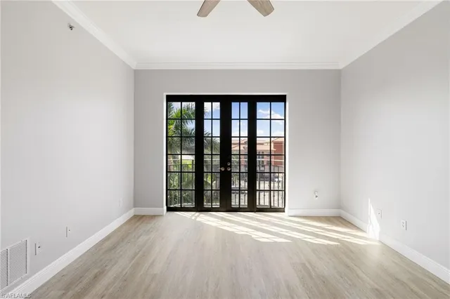 wooden floor and window in an empty room