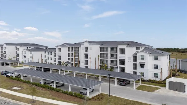 a view of a building with a swimming pool