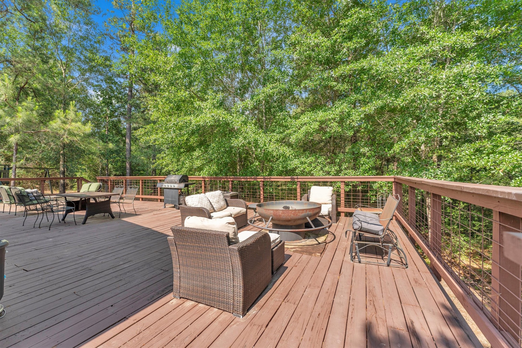 50 Fm 3179 Road Huntsville, TX 77320 - Photo 30 of 45 Expansive wraparound porch offers the perfect place to relax and take in the peaceful surroundings.