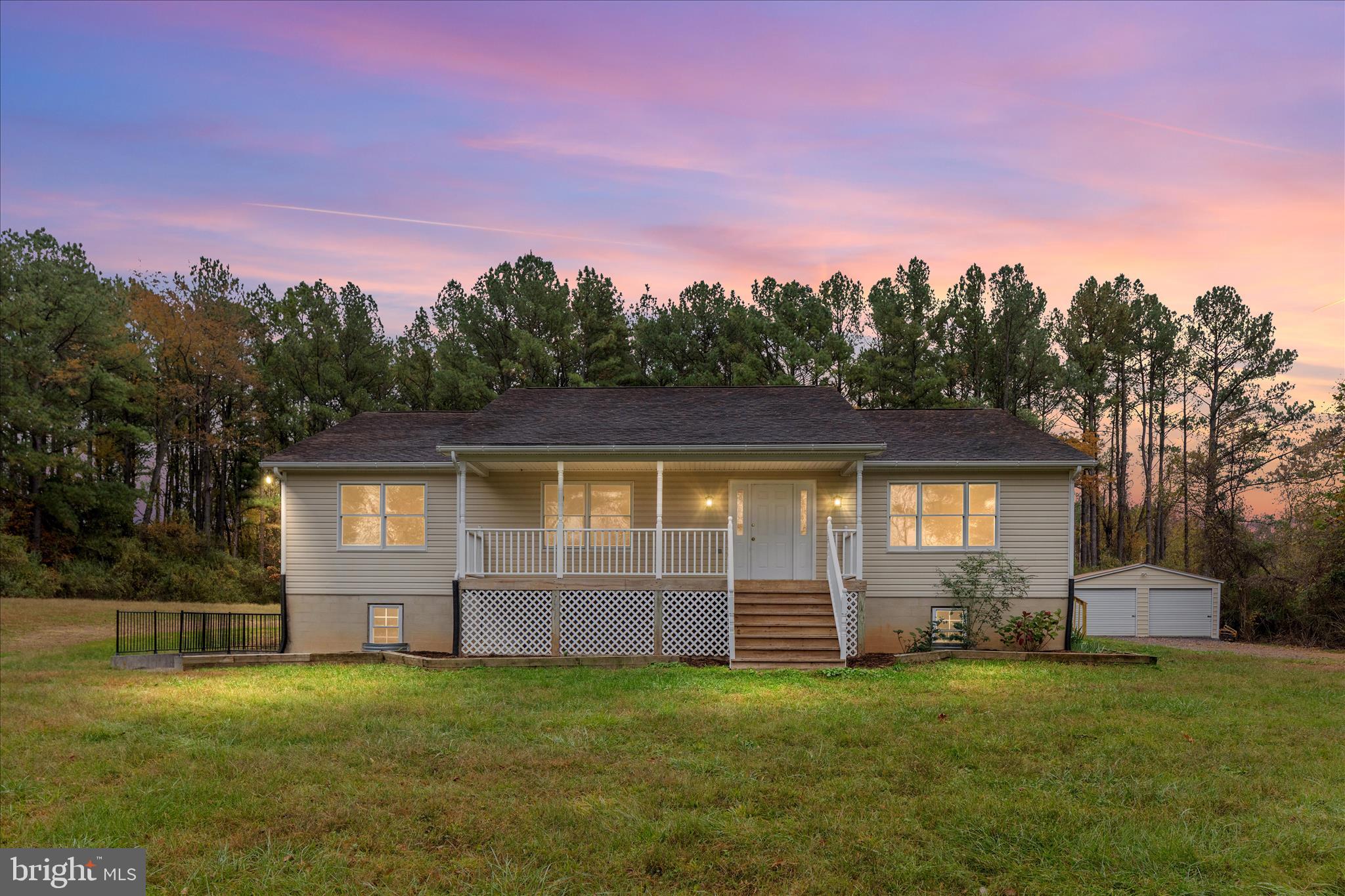 2983 Old Winchester Road Boyce, VA 22620 - Photo 41 of 91 a front view of a house with a yard and garage