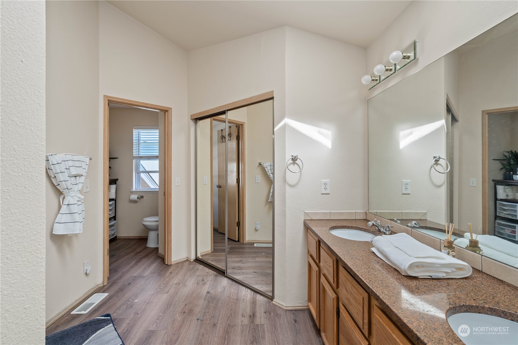 13631 Southeast 274th Place Kent, WA 98042 - Photo 17 of 31 a bathroom with a granite countertop sink a mirror and shower