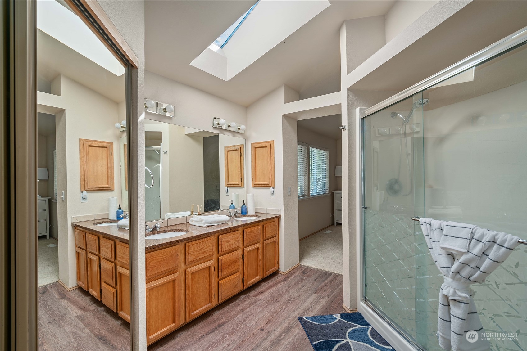 13631 Southeast 274th Place Kent, WA 98042 - Photo 18 of 31 a bathroom with a double vanity sink and a mirror
