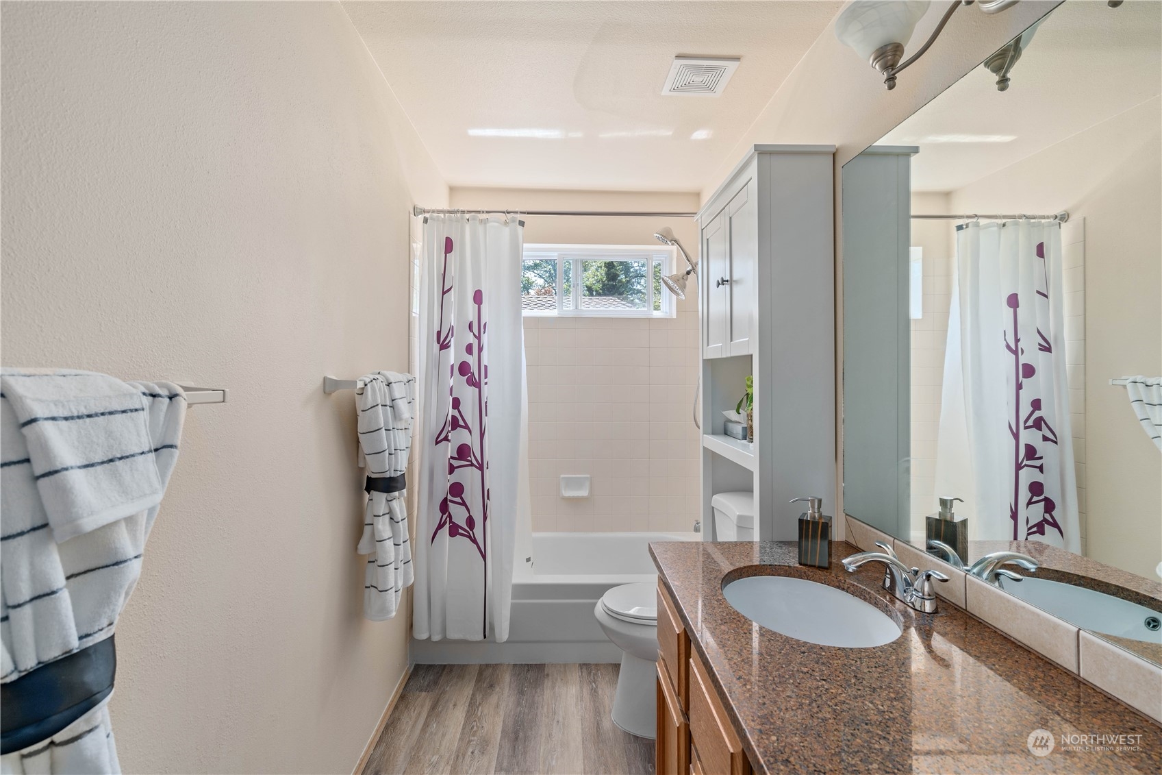 13631 Southeast 274th Place Kent, WA 98042 - Photo 21 of 31 a spacious bathroom with a granite countertop tub sink and a mirror