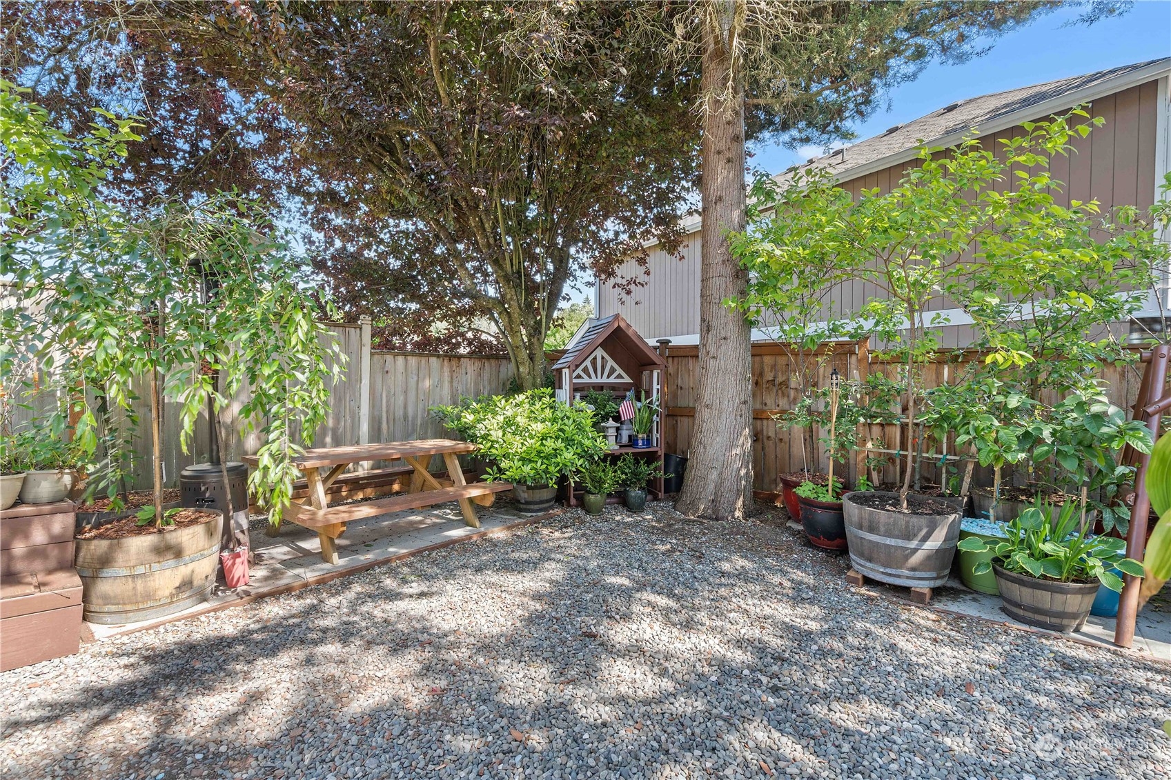13631 Southeast 274th Place Kent, WA 98042 - Photo 23 of 31 a view of a bench in the backyard