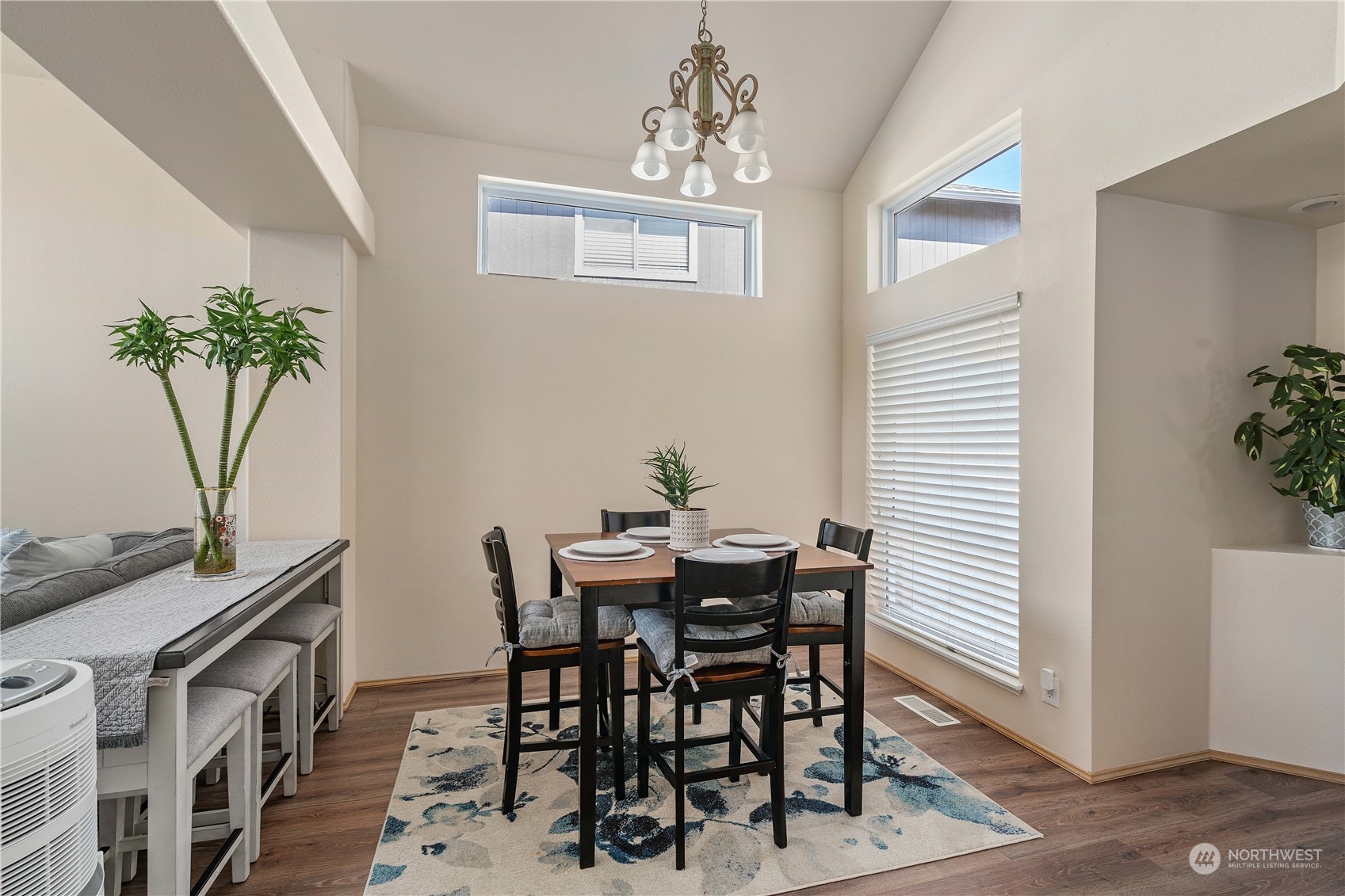 13631 Southeast 274th Place Kent, WA 98042 - Photo 7 of 31 a view of a dining room with furniture and a potted plant