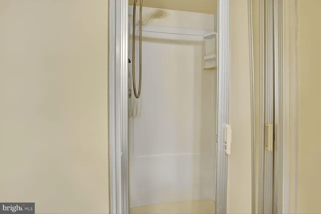 a view of a bathroom from a hallway