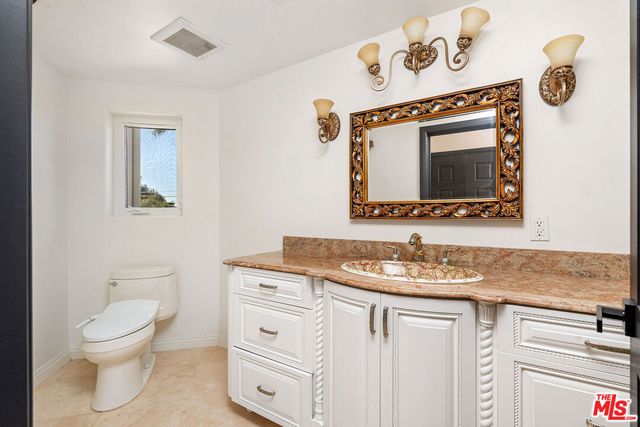 a view of a hallway with windows