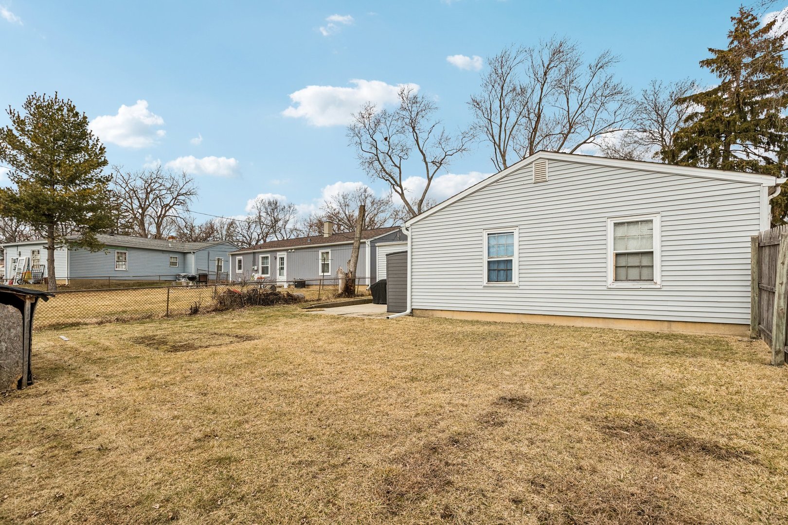 820 South Pine Street Streamwood, IL 60107 - Photo 23 of 23 a view of a house with backyard and tree