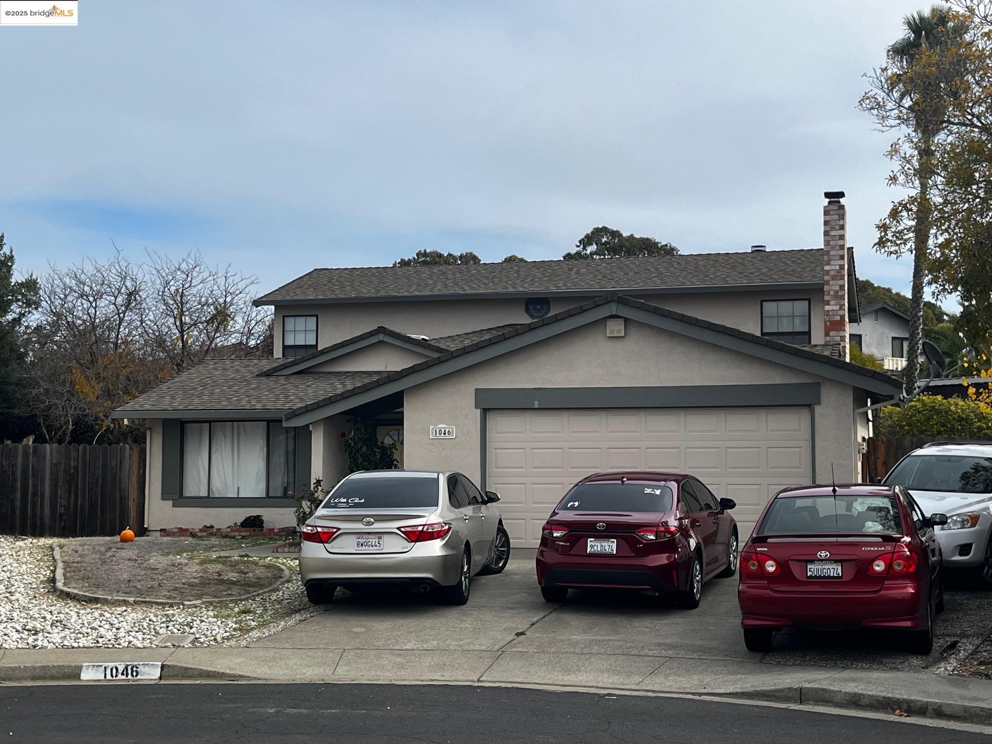 1046 Seascape Court Rodeo, CA 94572 - Photo 1 of 1 a front view of a house with parking space