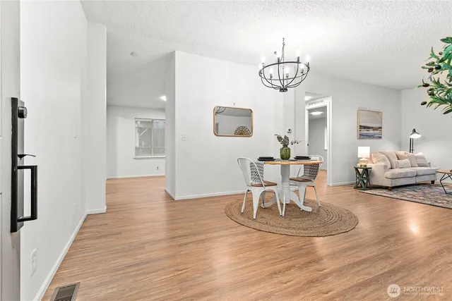 a view of a dining room with furniture