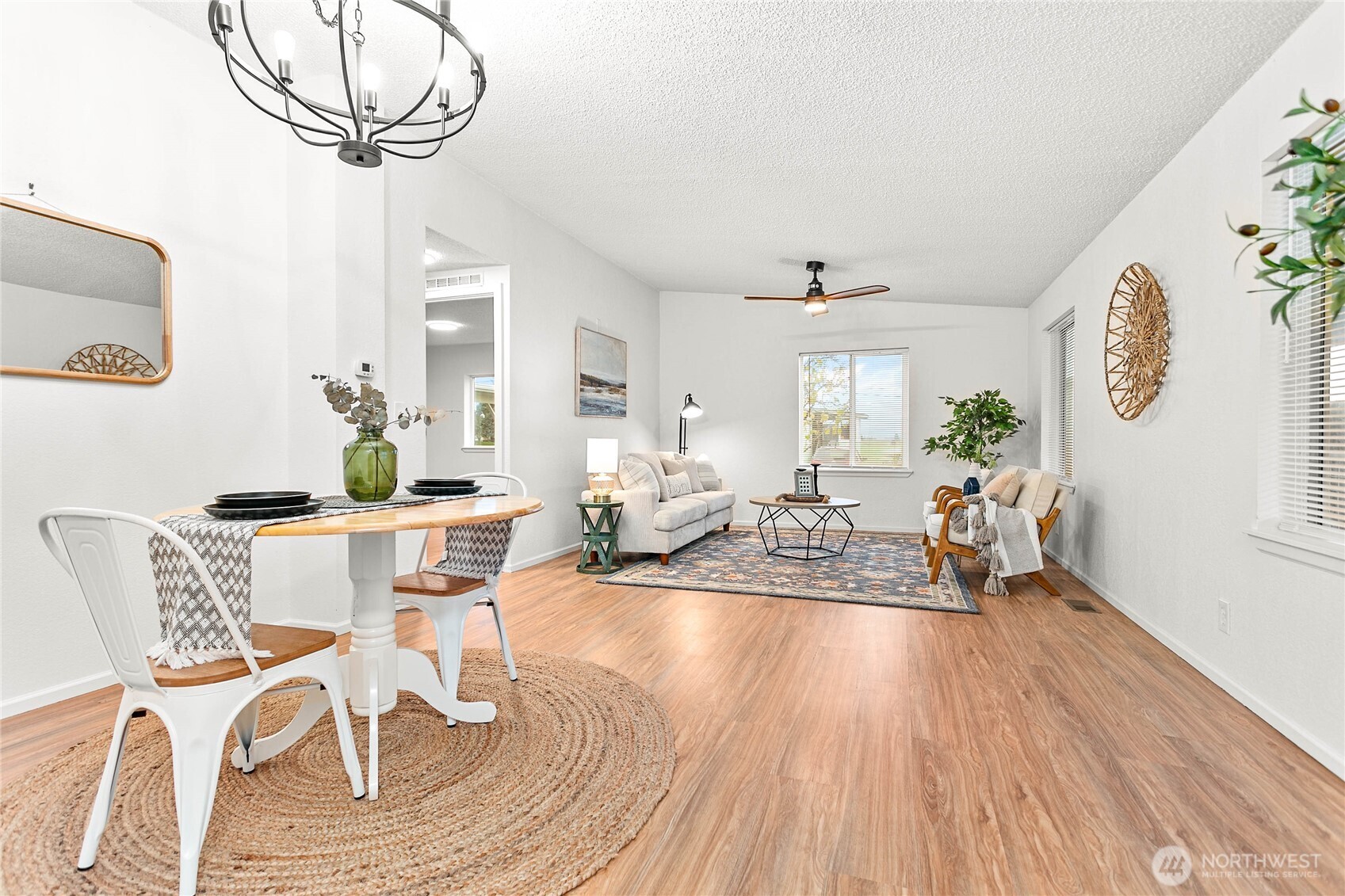 7343 Hannegan Road, Unit 2 Lynden, WA 98264 - Photo 6 of 34 a view of a dining room with furniture window and wooden floor