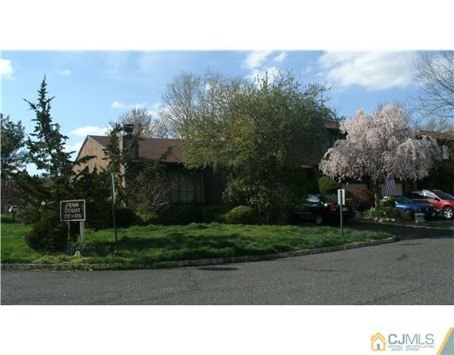 a black and white photo of a road