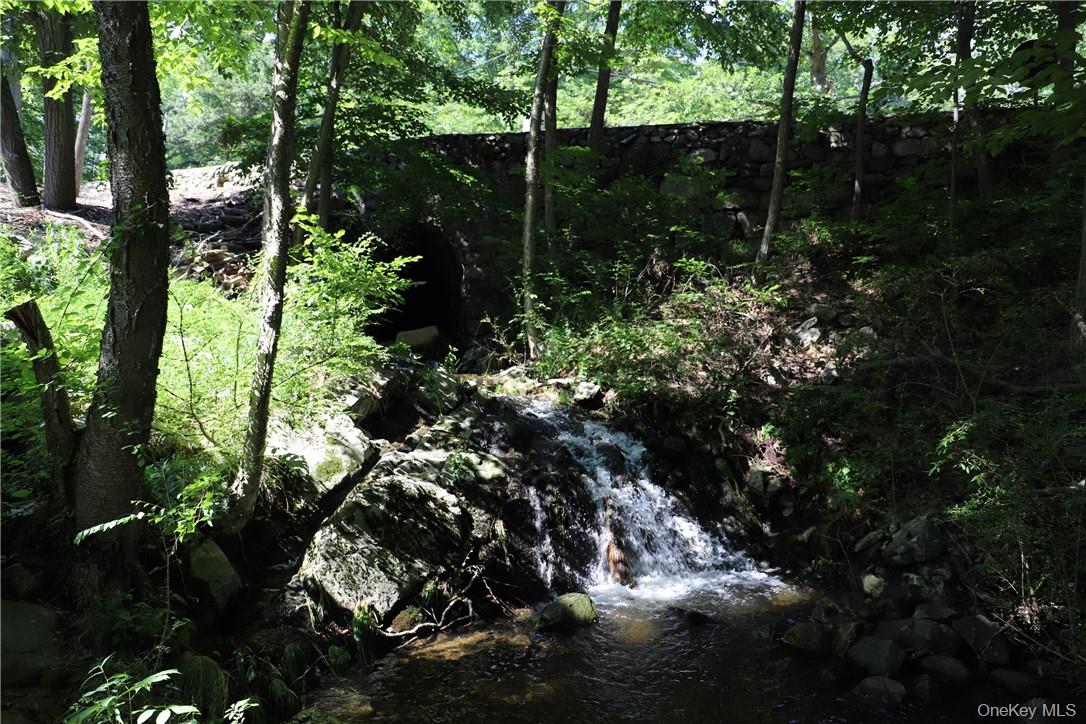Mountain Farm Road Tuxedo Park, NY 10987 - Photo 2 of 5 a view of outdoor space and covered with trees