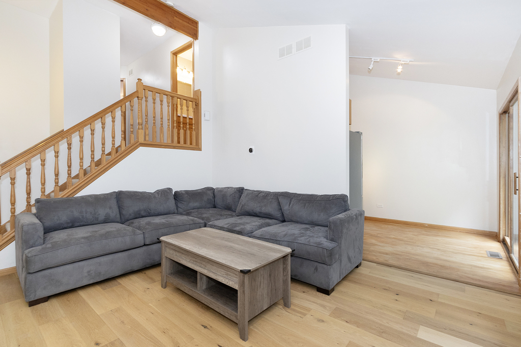 126 Twilight Lane New Lenox, IL 60451 - Photo 4 of 15 a living room with furniture and a wooden floor