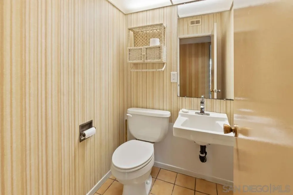 13510 Willow Run Road Poway, CA 92064 - Photo 16 of 24 a bathroom with a sink and a toilet