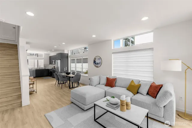 a living room with furniture and a table