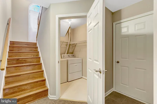 a view of an empty room with a fireplace