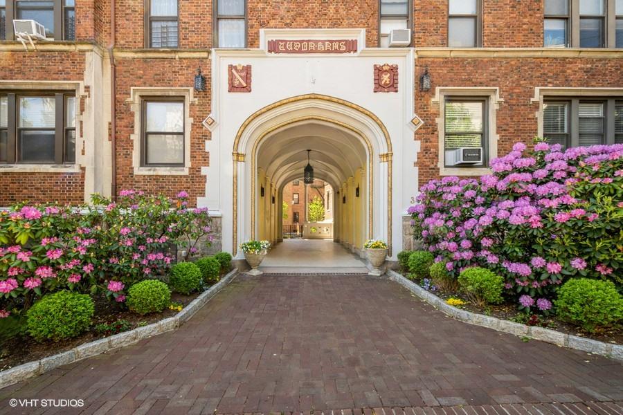 a view of a building with a garden