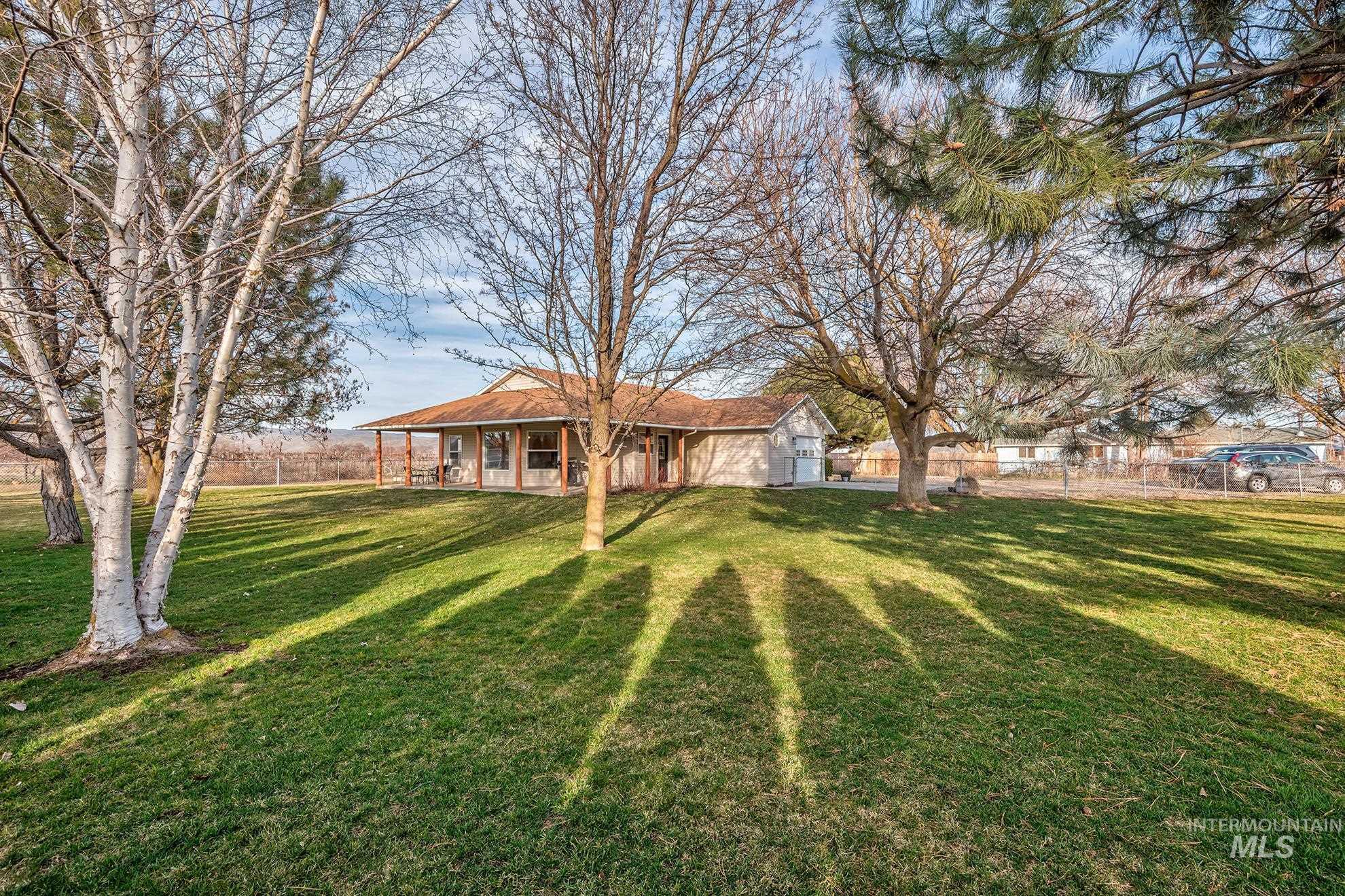 946 Indianhead Road Weiser, ID 83672 - Photo 2 of 36 View of yard featuring a patio