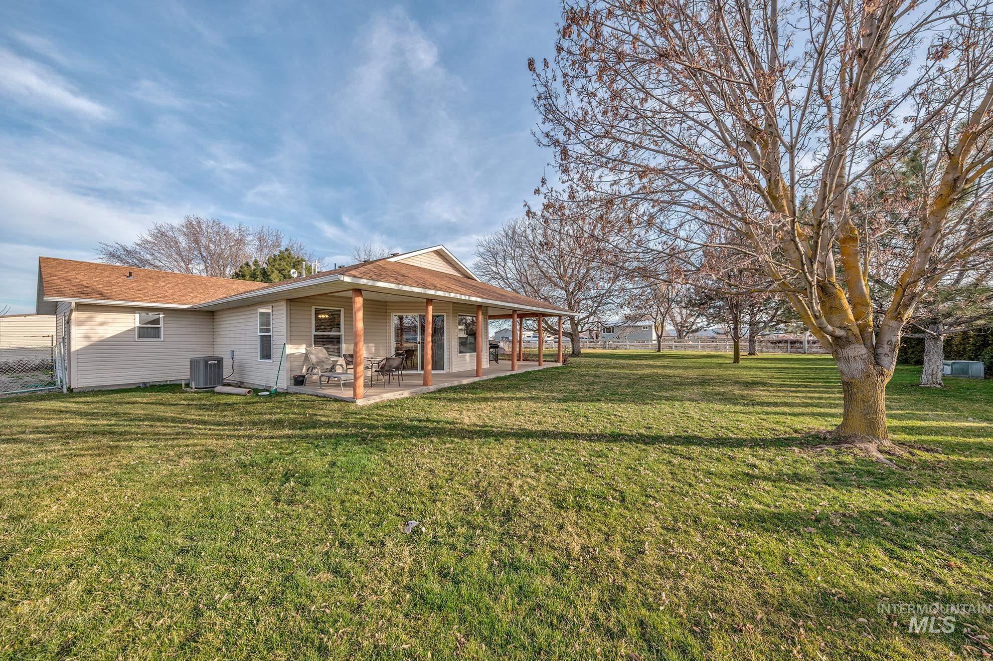 946 Indianhead Road Weiser, ID 83672 - Photo 29 of 36 Rear view of house with a patio