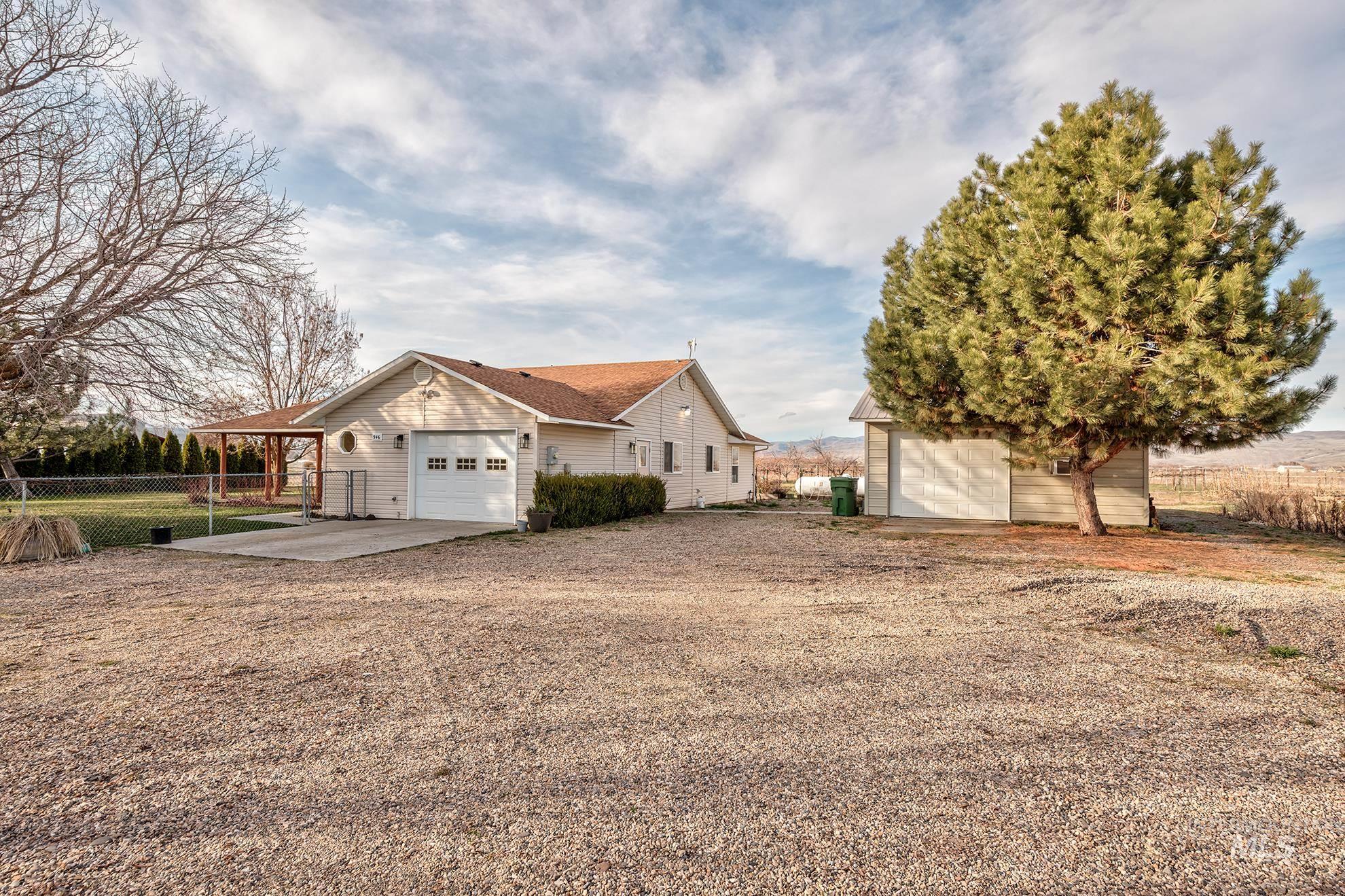 946 Indianhead Road Weiser, ID 83672 - Photo 3 of 36 View of side of property with an outdoor structure