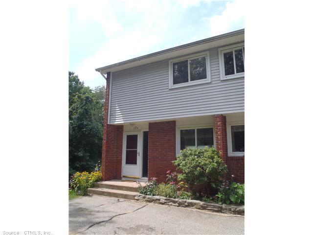 12 Anton Road, Unit 12A Mansfield, CT 06268 - Photo 1 of 1 a front view of a house with garden