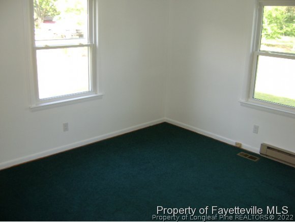 7840 Maxwell Road Stedman, NC 28391 - Photo 8 of 10 a view of an empty room with a window