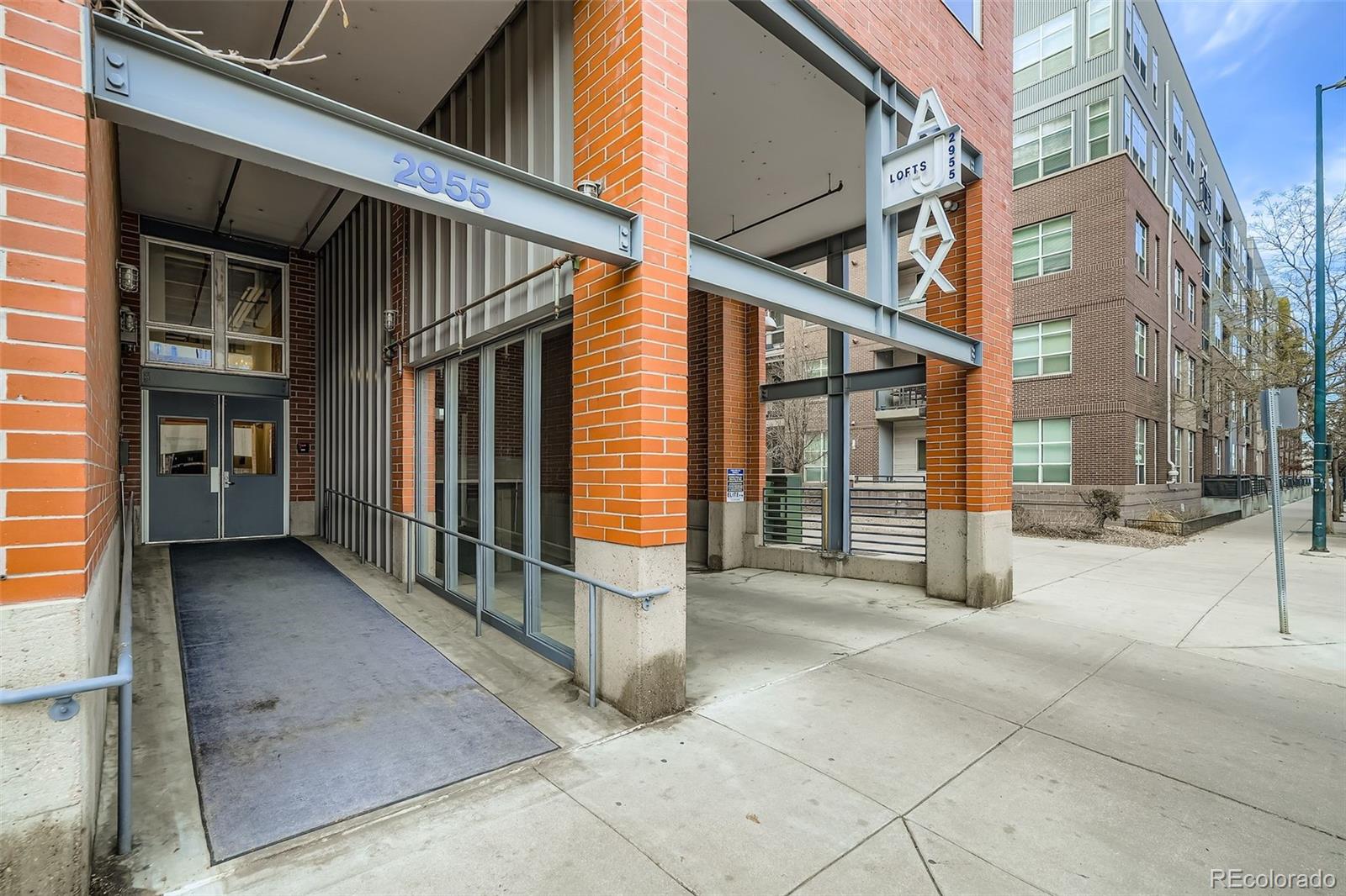 2955 Inca Street, Unit 2H Denver, CO 80202 - Photo 11 of 20 a view of a house with a large windows
