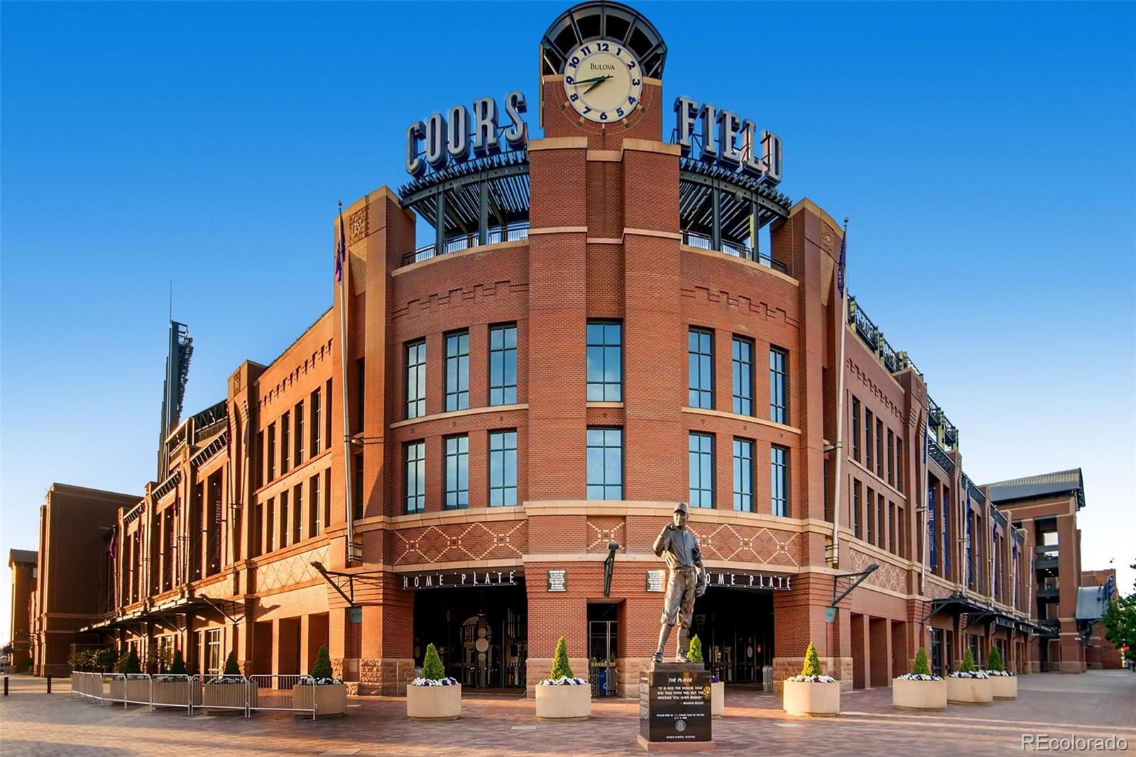 2955 Inca Street, Unit 2H Denver, CO 80202 - Photo 12 of 20 a front view of a building with lot of cars and trees