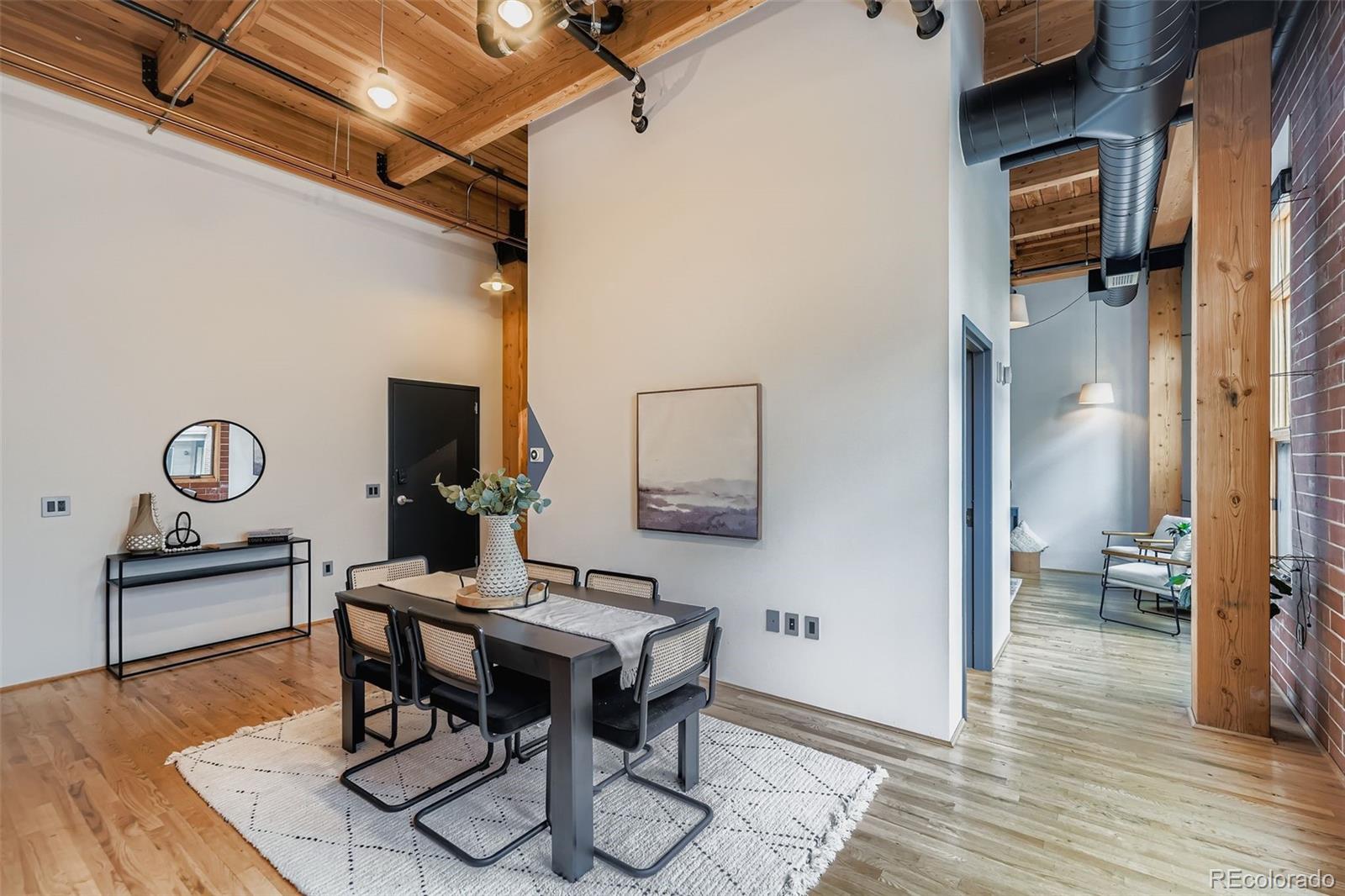 2955 Inca Street, Unit 2H Denver, CO 80202 - Photo 9 of 20 a view of a workspace with furniture