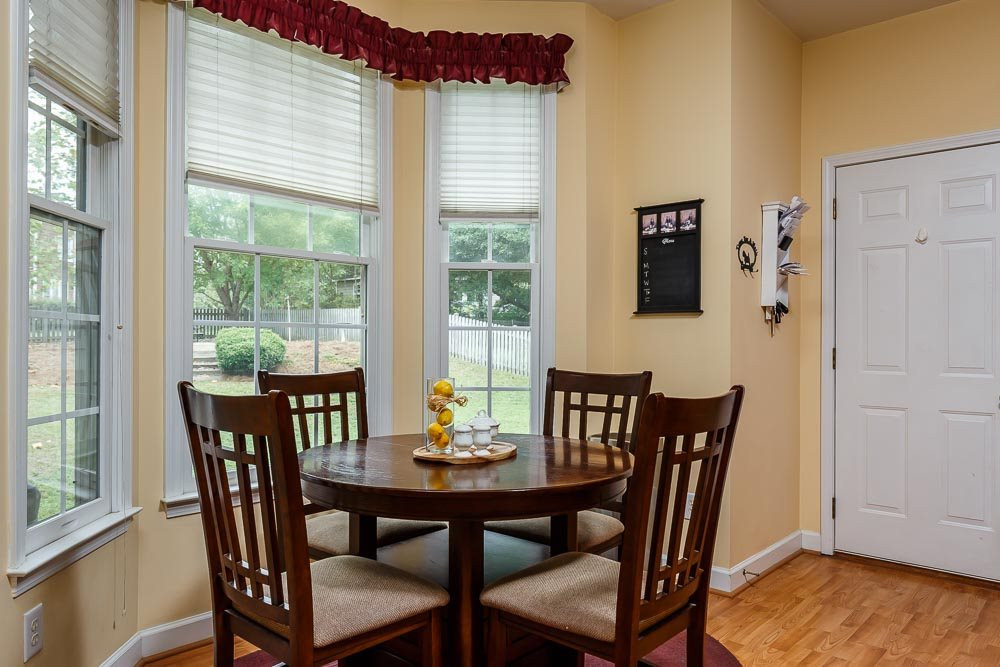 1607 Patterson Grove Road Apex, NC 27502 - Photo 5 of 25 Bright Bay window. Table can extend to sit 6 easily Breakfast Area