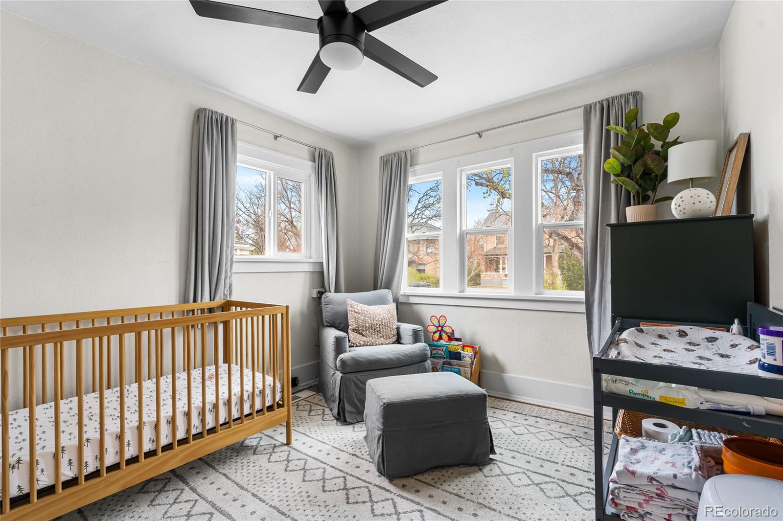 1445 Ash Street Denver, CO 80220 - Photo 26 of 45 a bedroom with furniture and a window