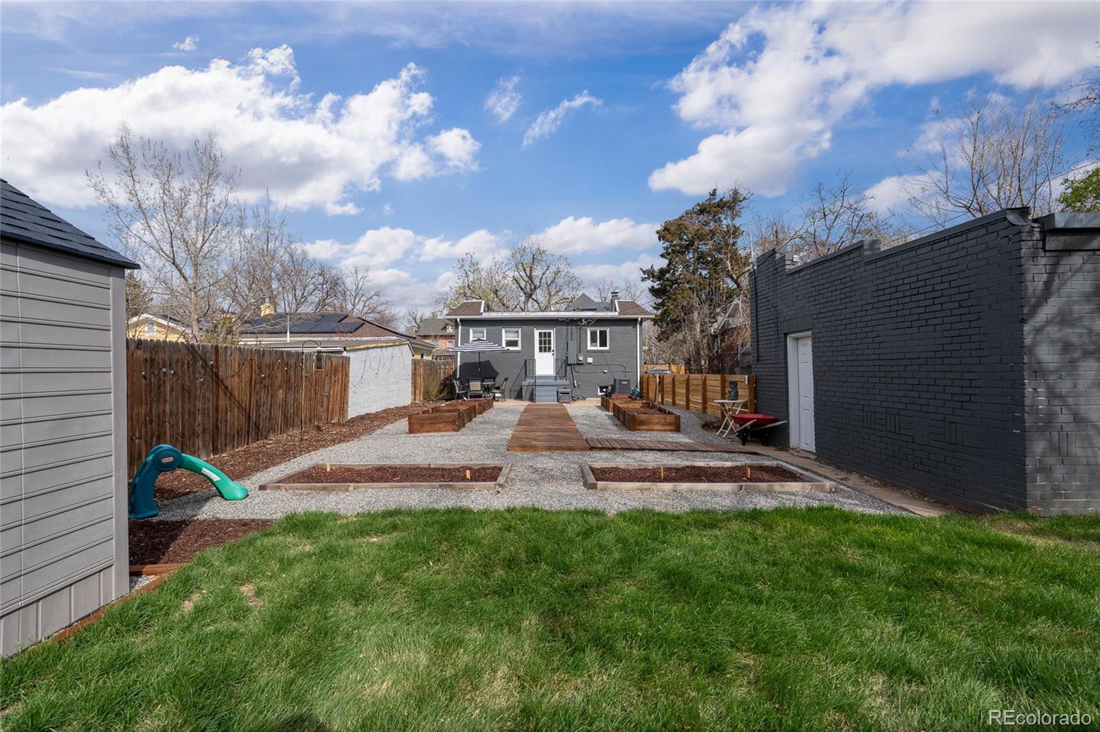 1445 Ash Street Denver, CO 80220 - Photo 43 of 45 a view of back yard of the house