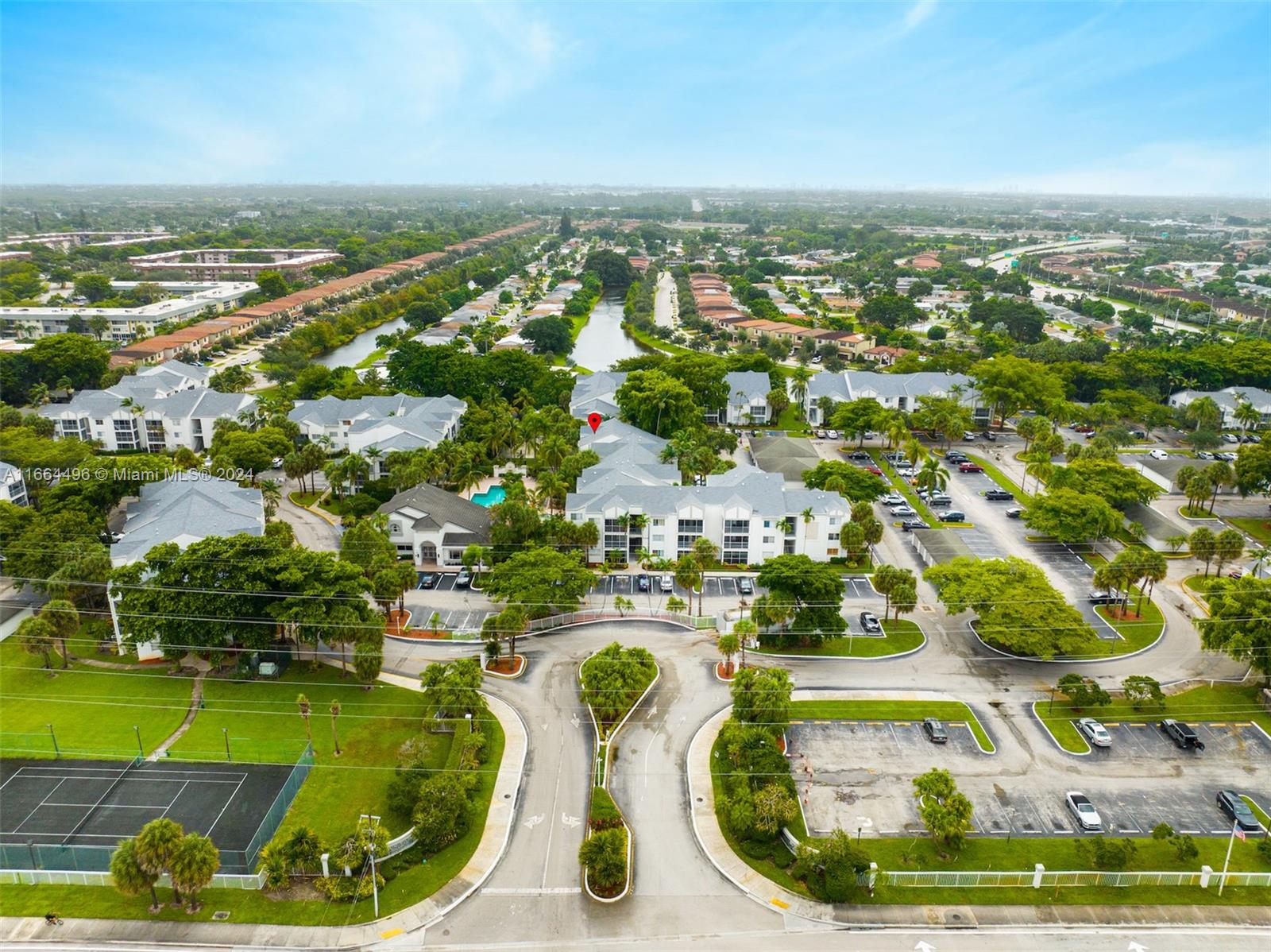 5672 Rock Island Road, Unit 259 Tamarac, FL 33319 - Photo 22 of 31 an aerial view of residential houses with outdoor space and swimming pool