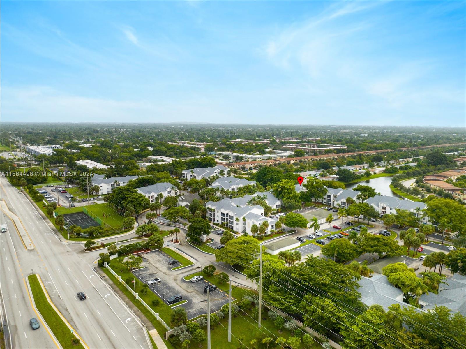 5672 Rock Island Road, Unit 259 Tamarac, FL 33319 - Photo 23 of 31 an aerial view of residential houses with outdoor space