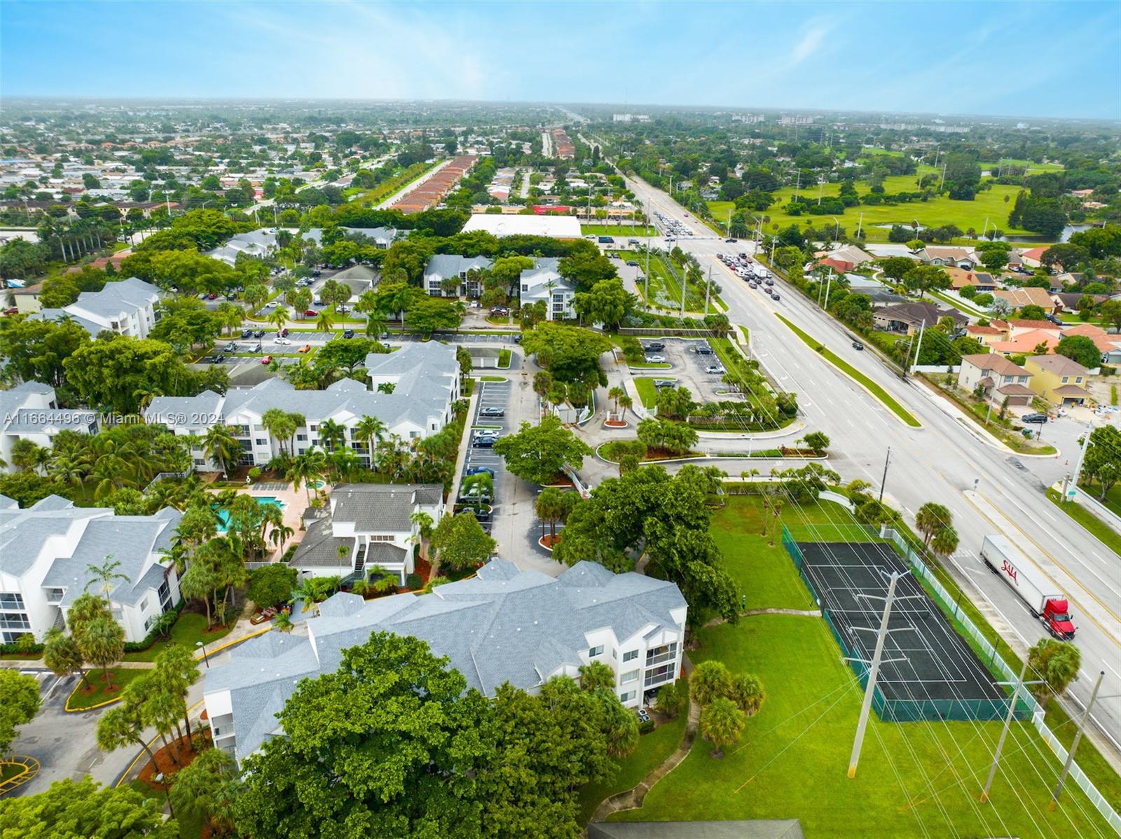 5672 Rock Island Road, Unit 259 Tamarac, FL 33319 - Photo 25 of 31 an aerial view of residential houses with outdoor space