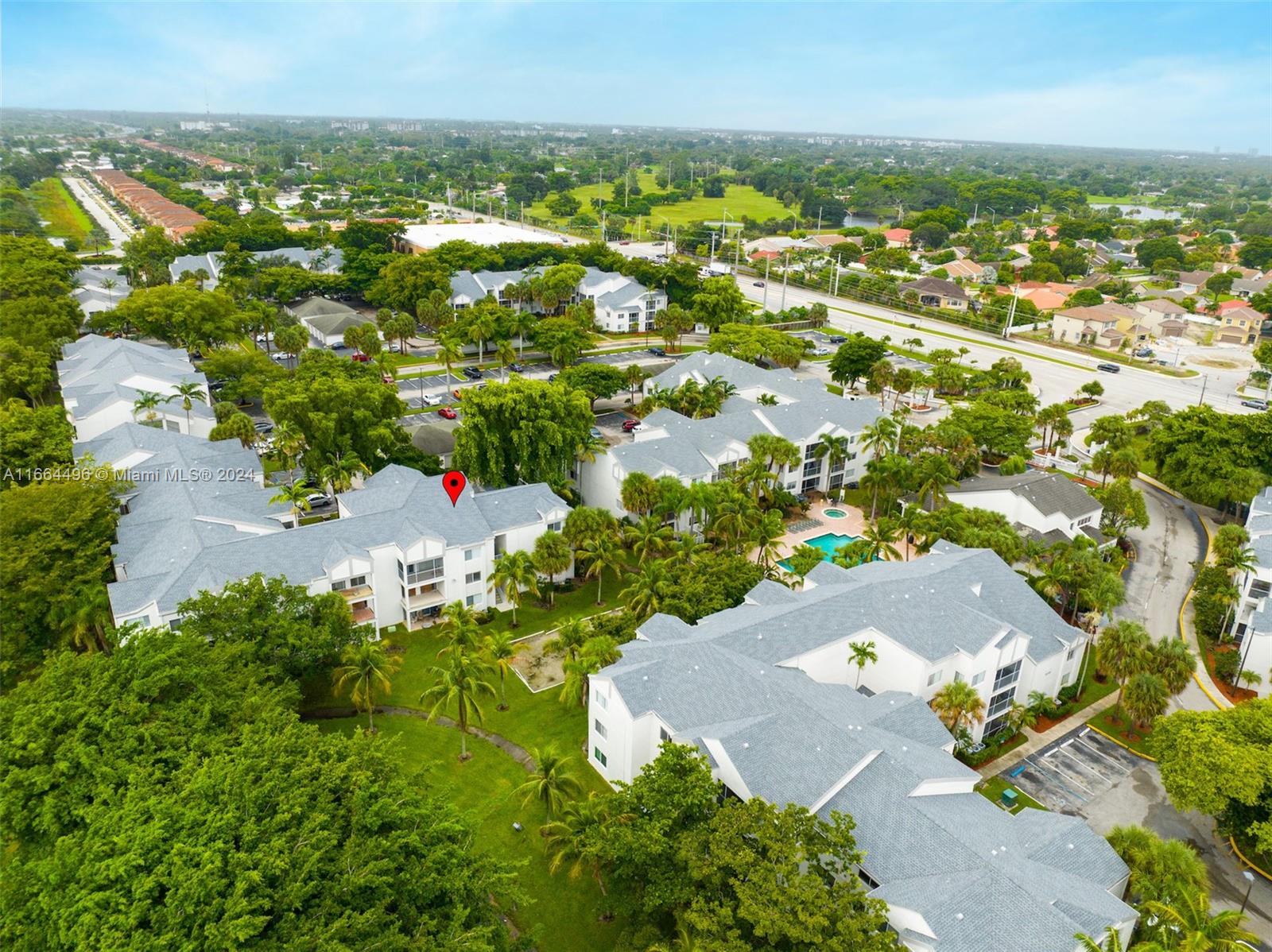 5672 Rock Island Road, Unit 259 Tamarac, FL 33319 - Photo 26 of 31 an aerial view of residential houses with outdoor space and trees all around
