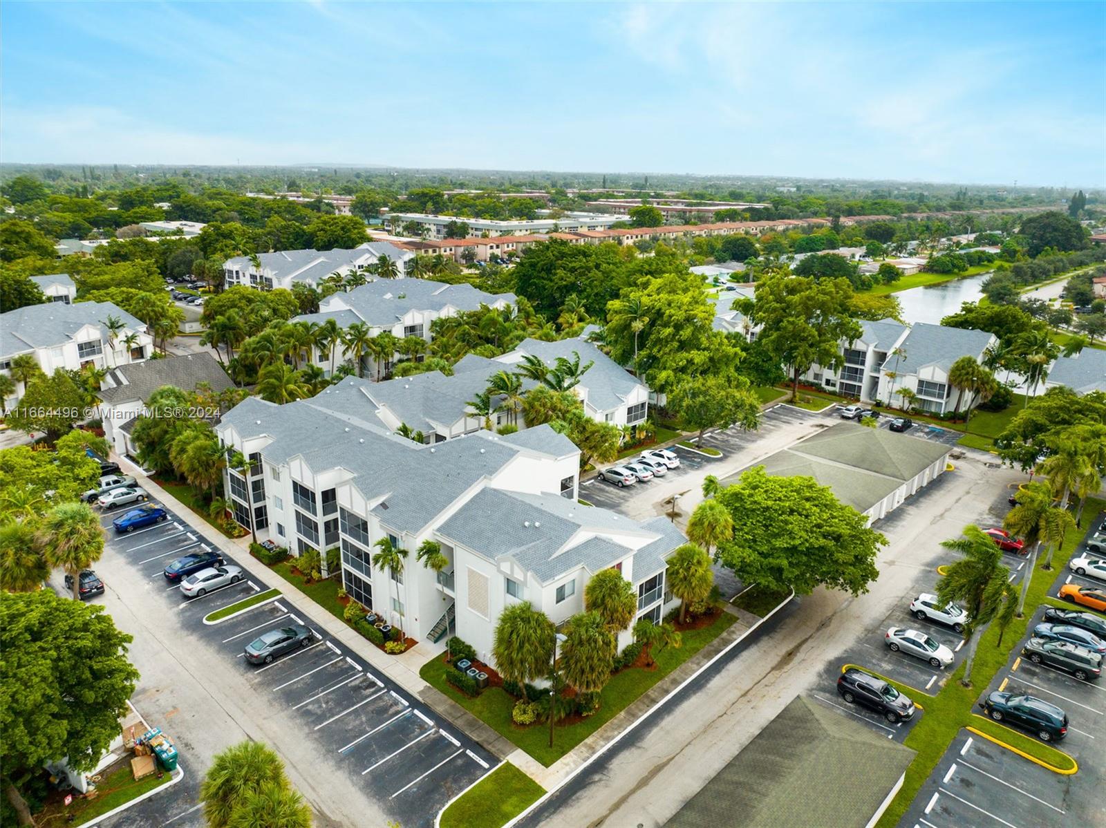5672 Rock Island Road, Unit 259 Tamarac, FL 33319 - Photo 28 of 31 an aerial view of residential houses with outdoor space