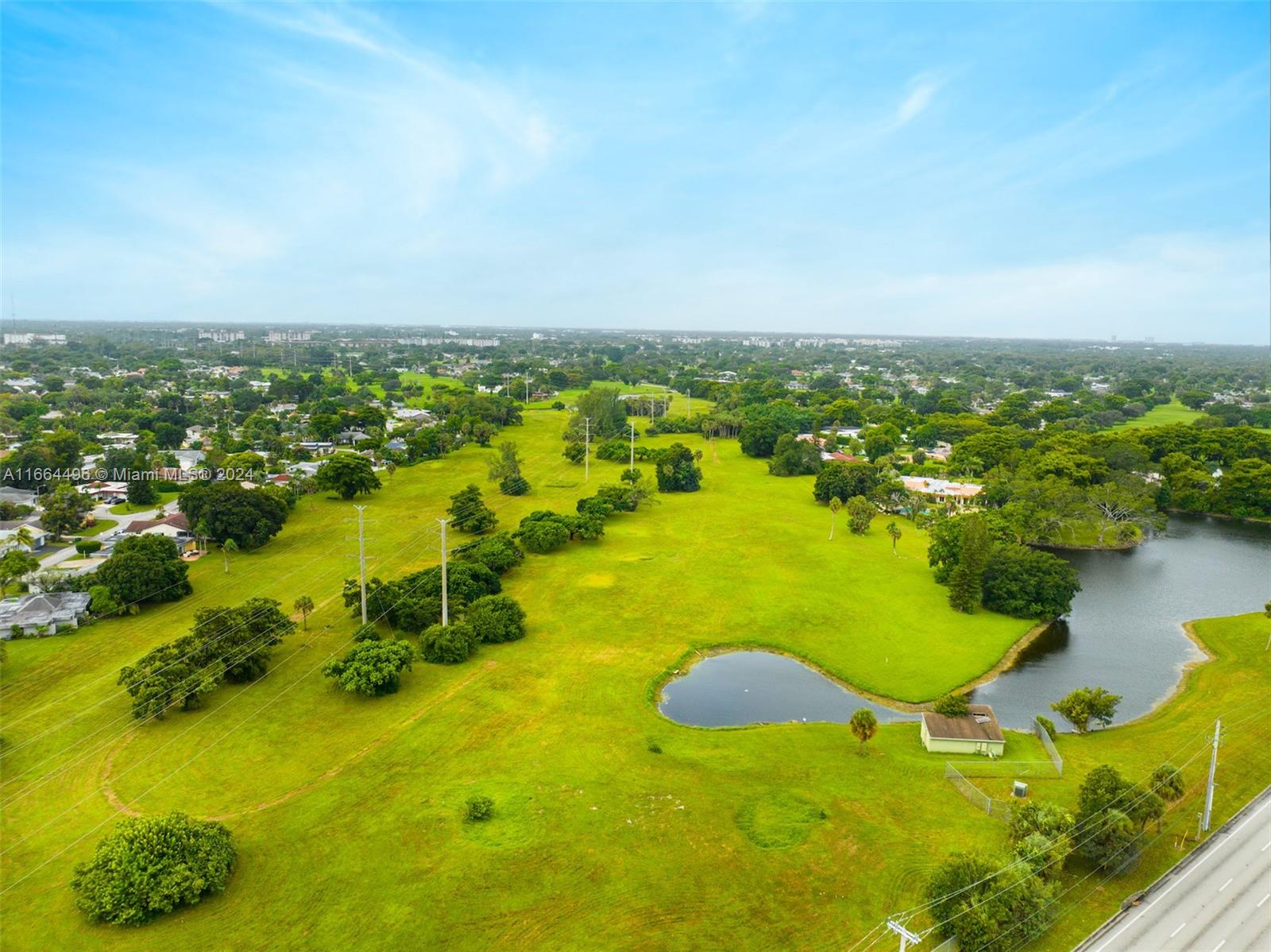 5672 Rock Island Road, Unit 259 Tamarac, FL 33319 - Photo 29 of 31 an aerial view of residential houses with outdoor space