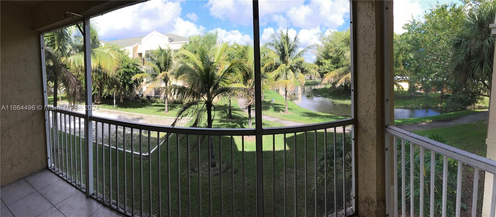 5672 Rock Island Road, Unit 259 Tamarac, FL 33319 - Photo 5 of 31 a view of a balcony with lake view
