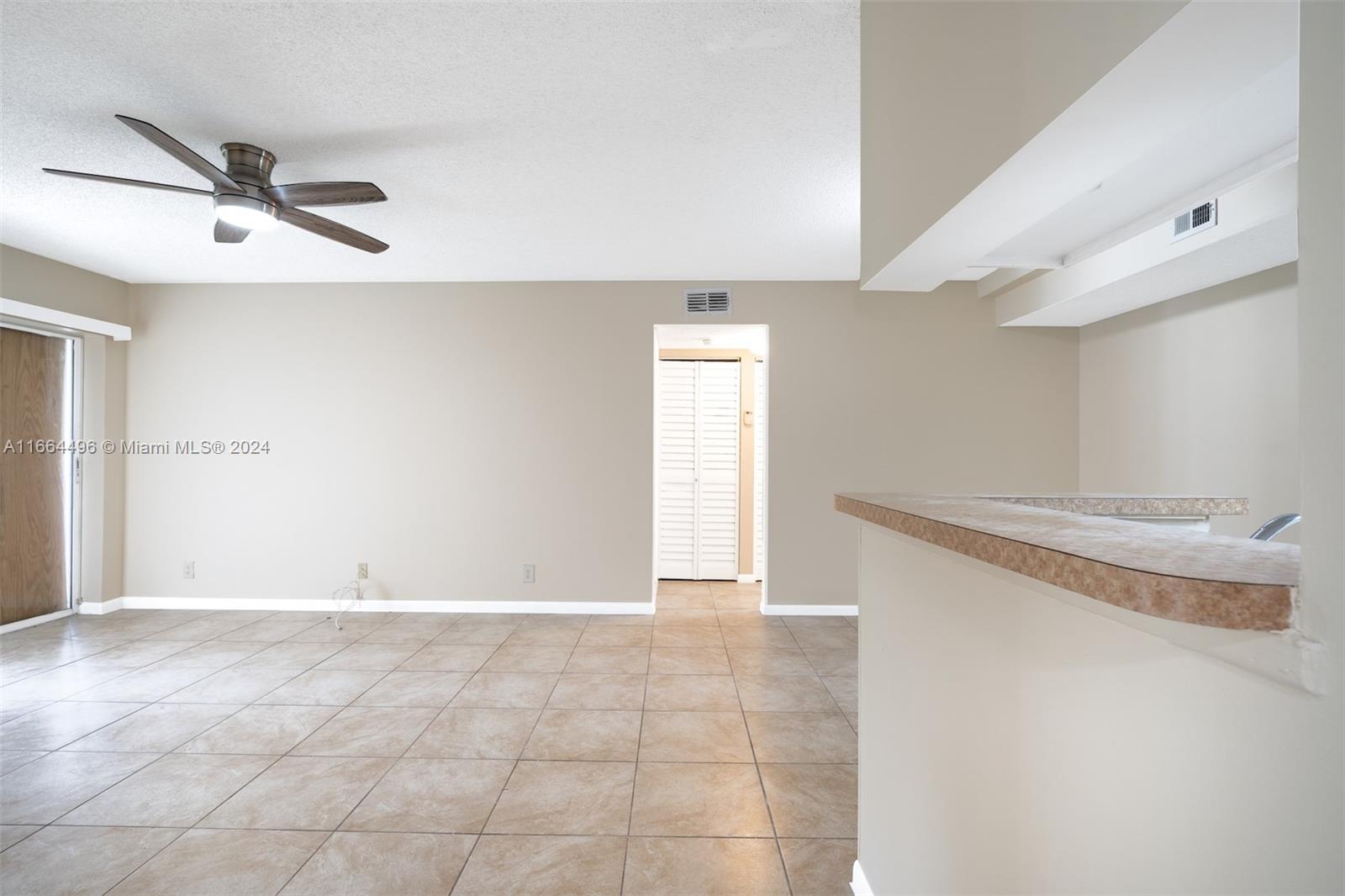 5672 Rock Island Road, Unit 259 Tamarac, FL 33319 - Photo 8 of 31 a view of an empty room