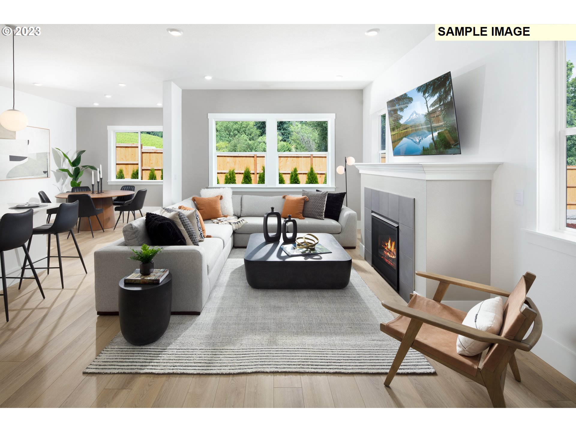 17860 Southwest Maiden Court Beaverton, OR 97007 - Photo 6 of 23 a living room with furniture and a fireplace