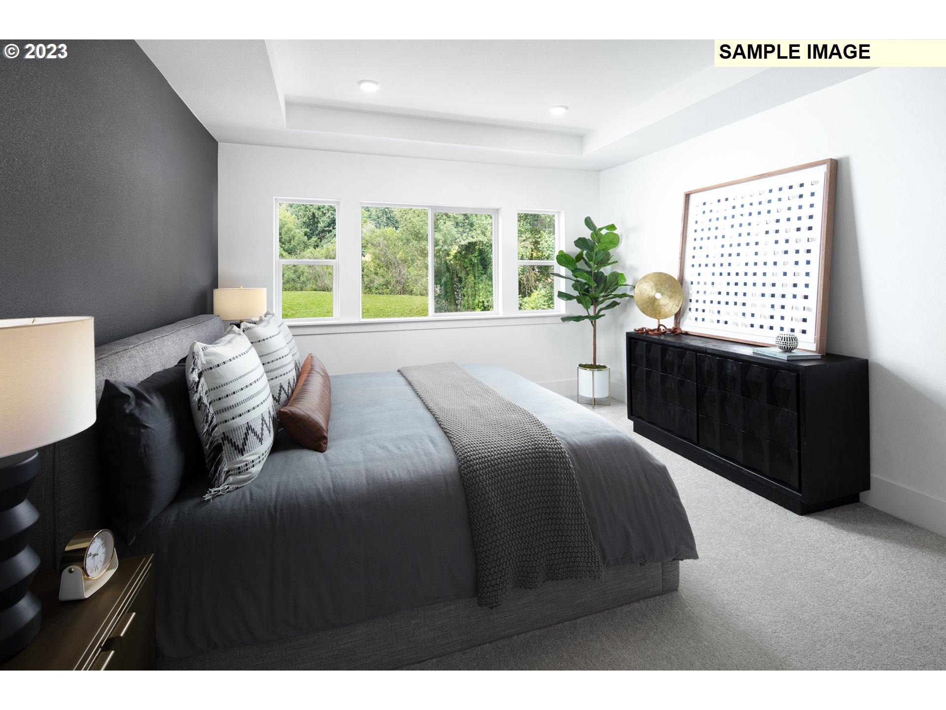 17860 Southwest Maiden Court Beaverton, OR 97007 - Photo 10 of 23 a bedroom with a bed lamp and a large window