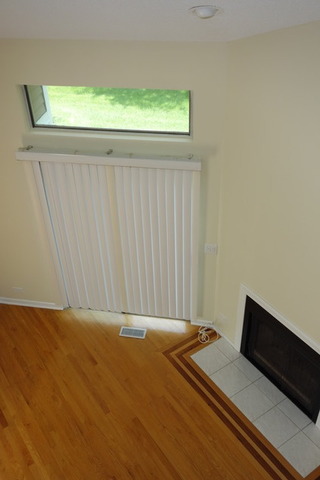 1261 Ranchview Court Buffalo Grove, IL 60089 - Photo 17 of 23 a bedroom with a bed and a window