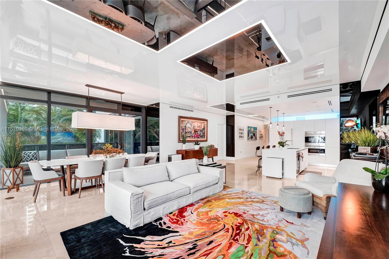 2101 South Surf Road, Unit 3C Hollywood, FL 33019 - Photo 2 of 23 a living room with furniture and a large window