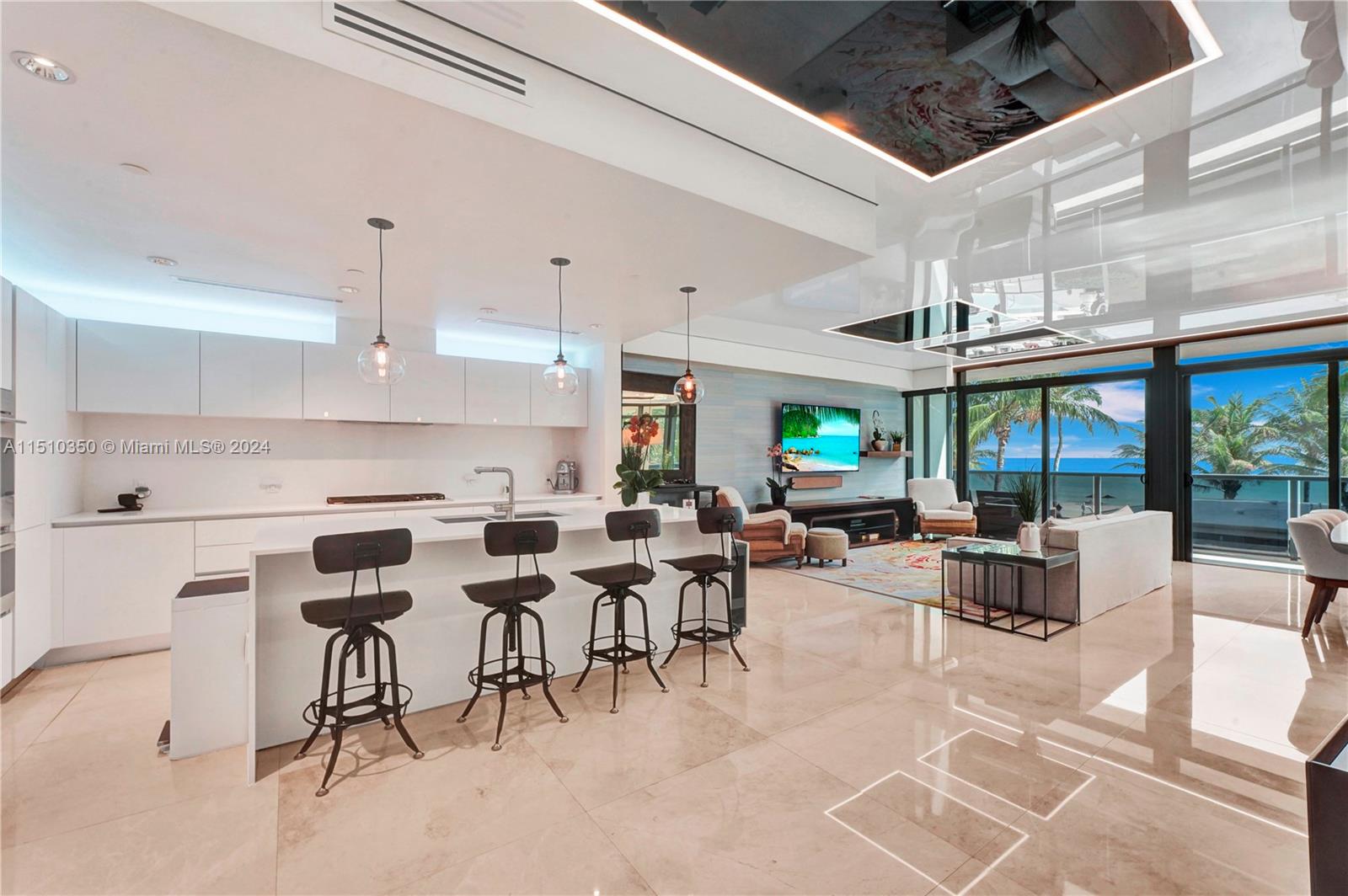 2101 South Surf Road, Unit 3C Hollywood, FL 33019 - Photo 4 of 23 a group of people sitting in a living room